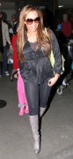 Мелани Браун (Melanie Brown) Arriving on a flight at LAX airport in Los Angeles April 15, 2011 - 29xHQ Fe2cb0201666609